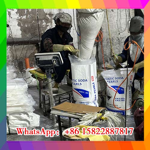 Automated packaging facility filling high purity caustic soda pearls 99% with moisture-shield engineering